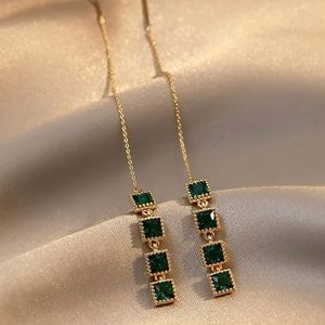 Beautiful emerald and gold earrings ..